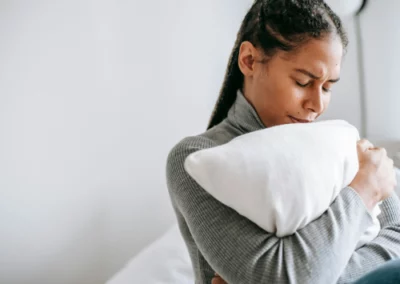 Girl holding pillow